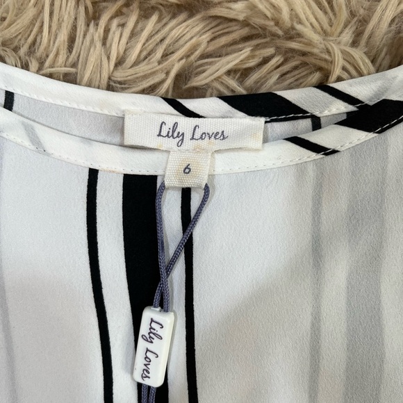 Asymmetrical tunic - Picture 3 of 3